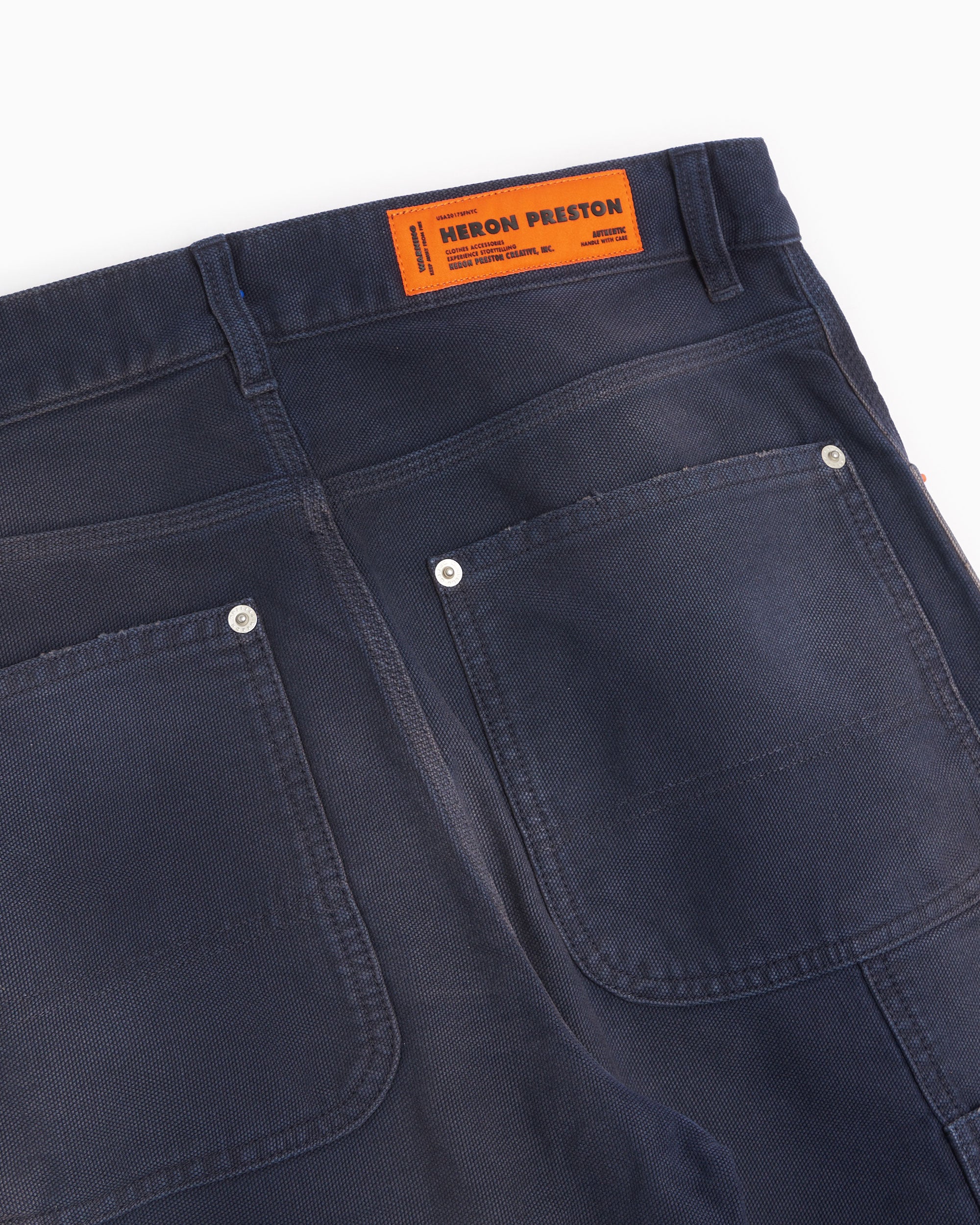 pants-heron-preston-distressed