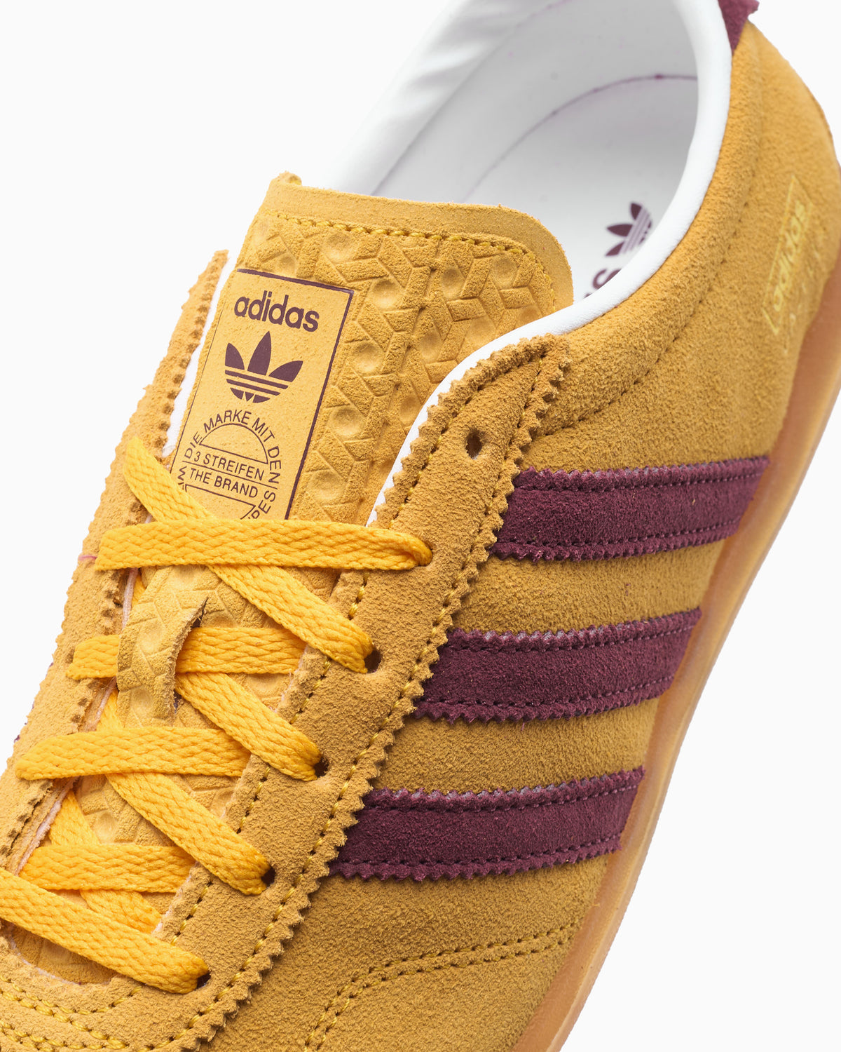 adidas tobacco yellow Samba OG The gum sole grounds the look Adidas Tobacco on feet on