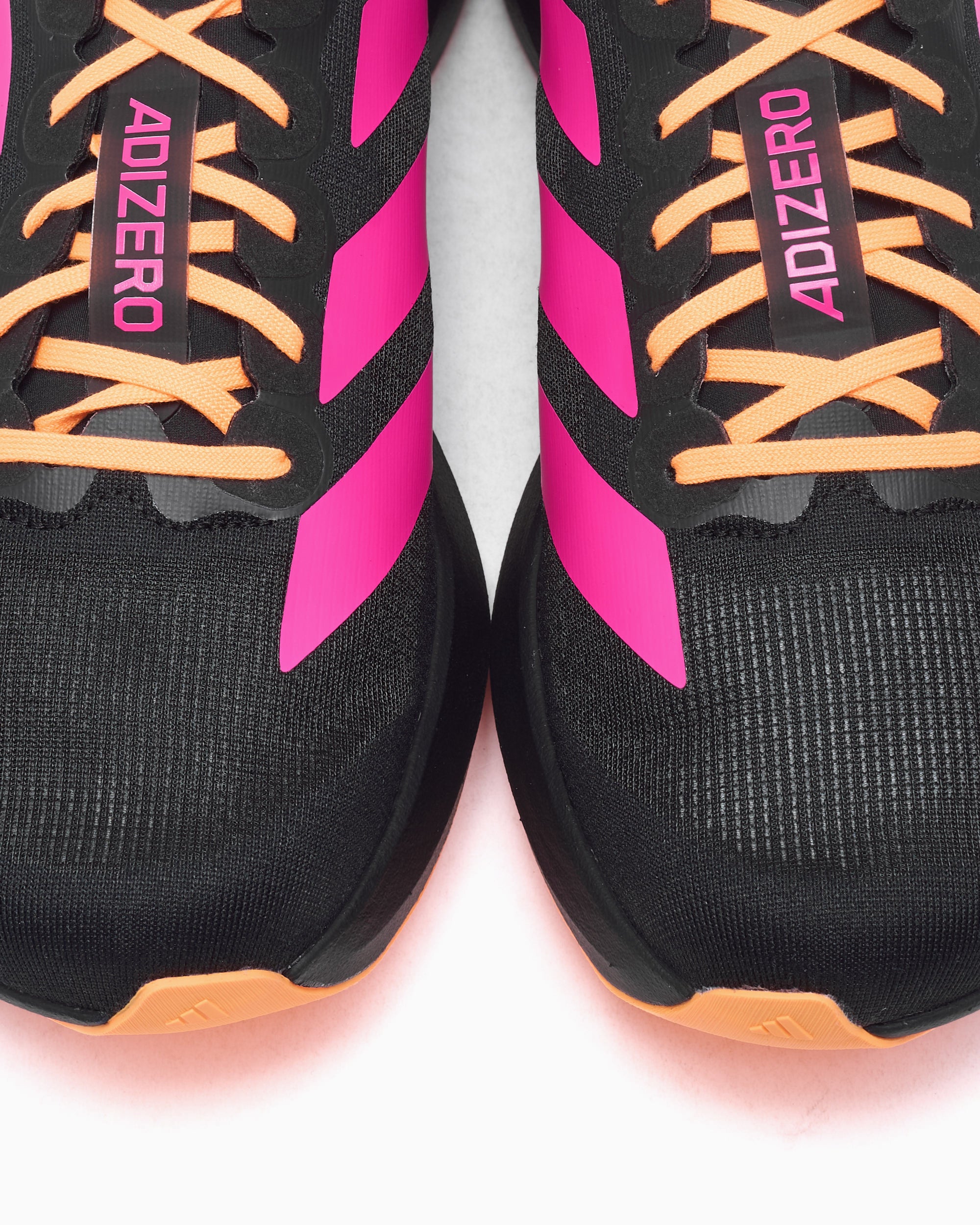 adidas ADIZERO Evo SL M 27.5 ブラック オレンジ adidas ADIZERO EVO SL Trainers in Carbon / Black Lucid Orange
