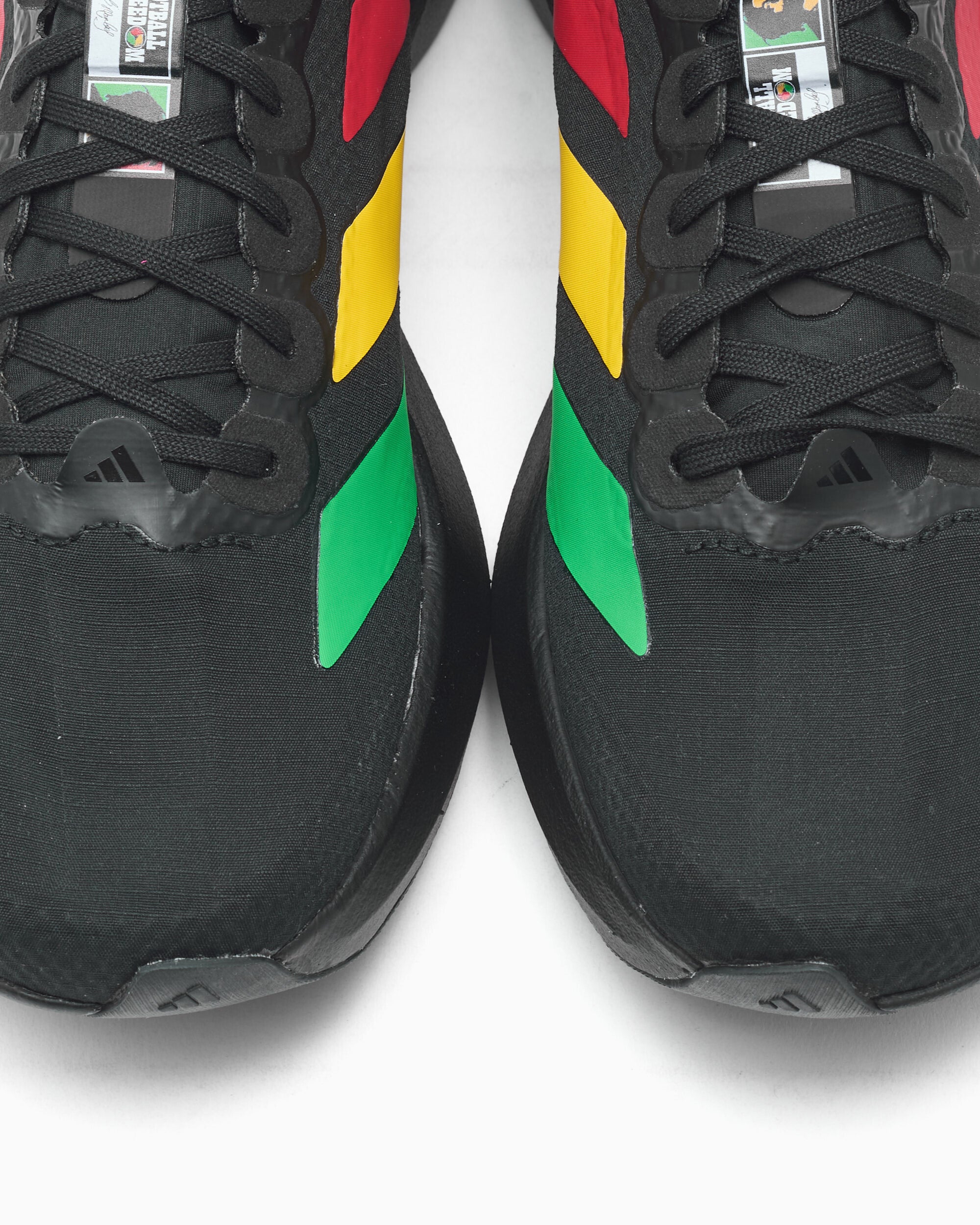 Sneakers adidas Performance x Bob Marley Women's Adizero Evo SL "Jamaica" - KJ6159
